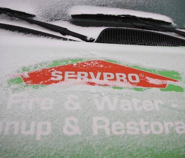 snow covering SERVPRO vehicle