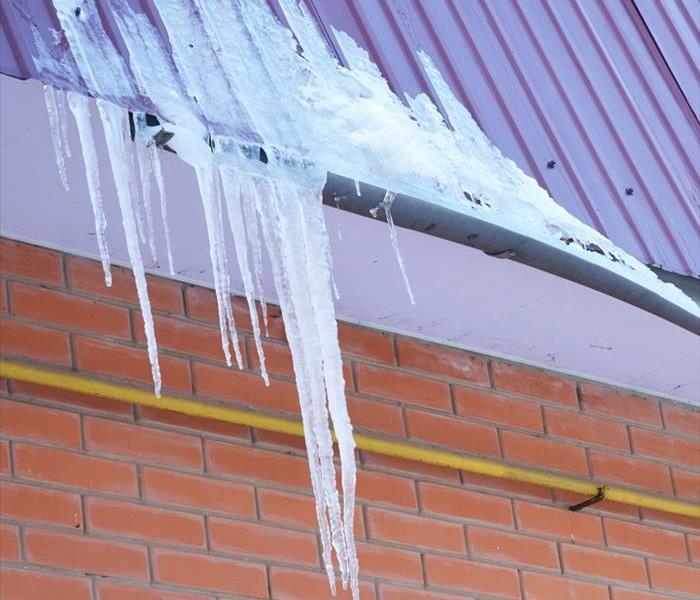 Icicles on roof; ice dam formed