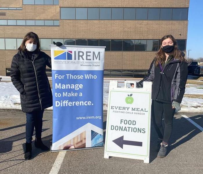 Janet and Tierney IREM Food Drive